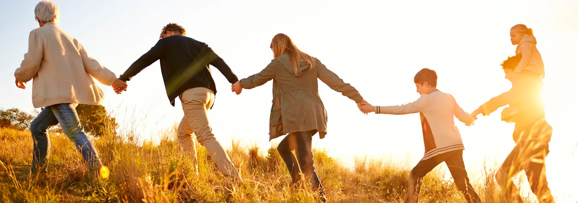 Family Holding Hands 1935 x 682.jpg.webp