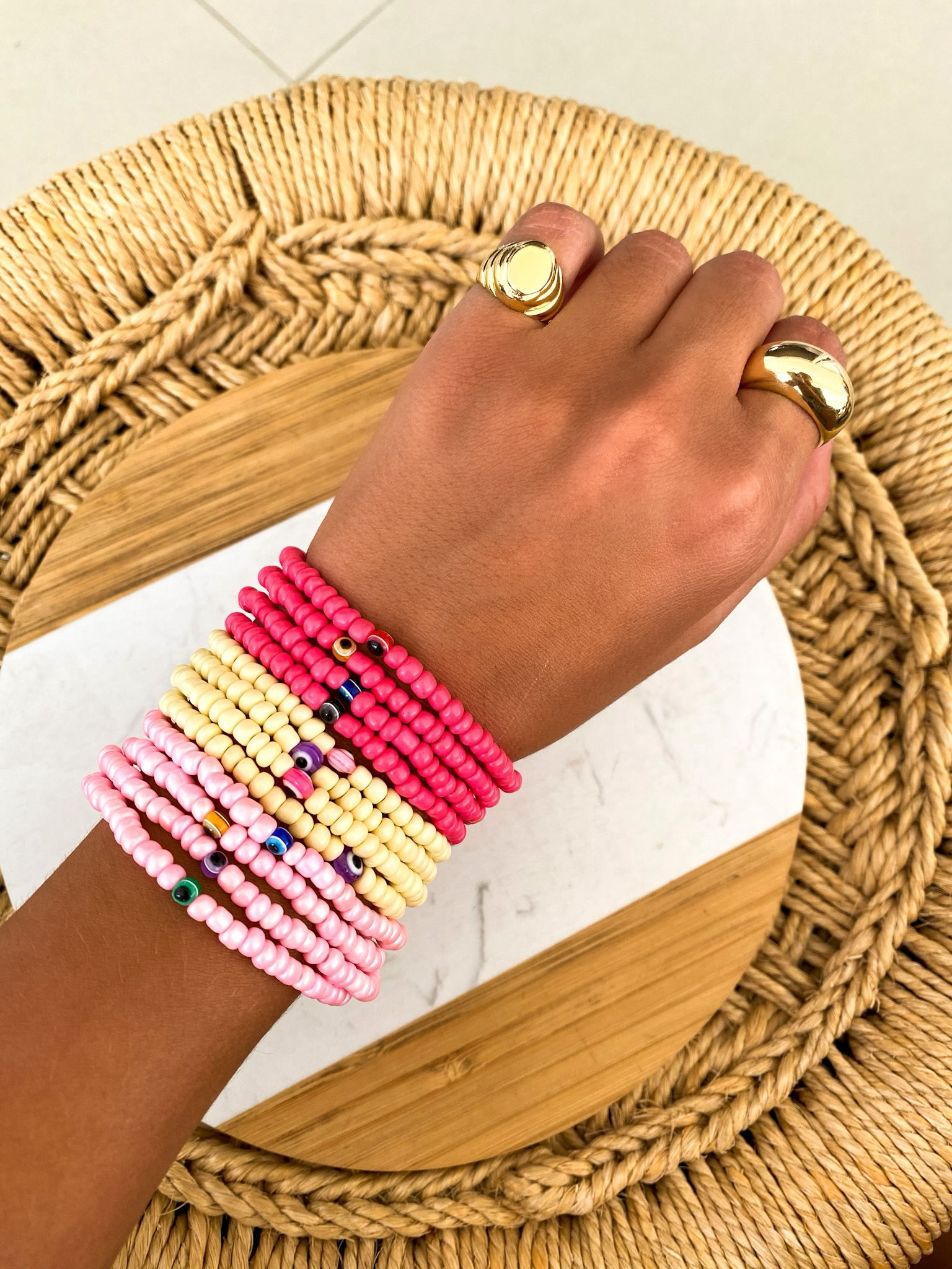 KIT PULSEIRAS MICANGAS CORAL + MINI OLHO GREGO