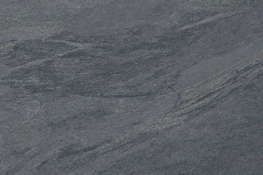 Cathedral Anthracite Porcelain Paving slabs featured in a modern outdoor setting