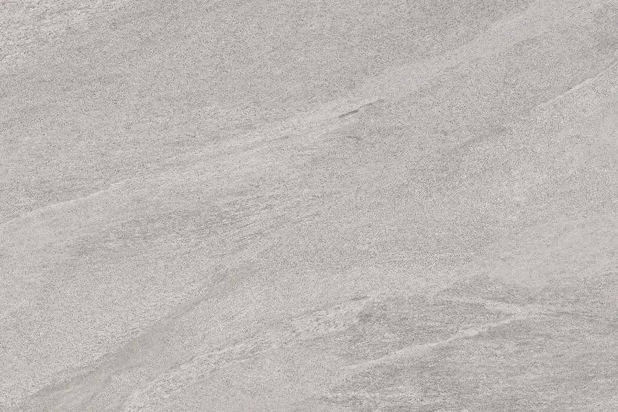 Large grey porcelain paving slabs showing smooth texture and clean edges
