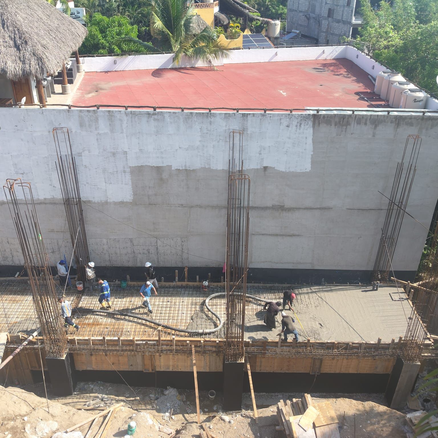 Structural slab concrete pour at NAYARI in June