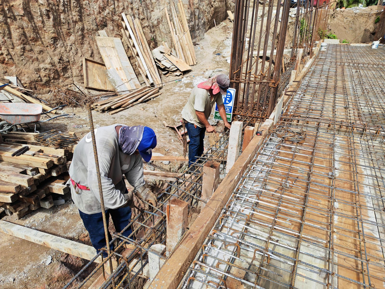 Workers installing reinforcement steel at NAYARI in July
