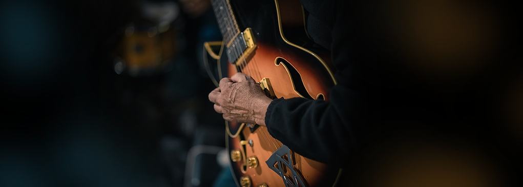 Guitar Wix Unsplash longest centered.png