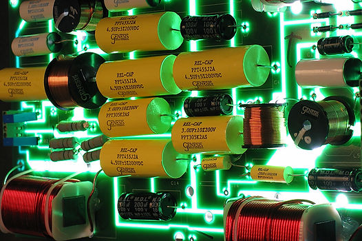 Close up of glowing internal components of a Genesis Loudspeakers stereo system