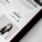 A woman's social media profile links on a screen