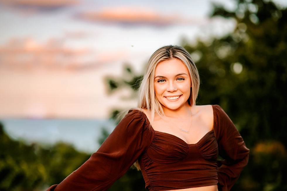 Paula Hould Photography-SeniorPhotography-Senior Girl with beautiful sky behind her