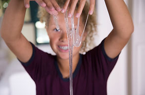 Child engaging in messy play