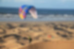 Voyage parapent au Maroc, voler sur les dunes de sable. découverte des sites du sud marocain comme la plage blanche, Legzira, le Nid d'Aigle, Bounhaman, Aglou, Tifnit