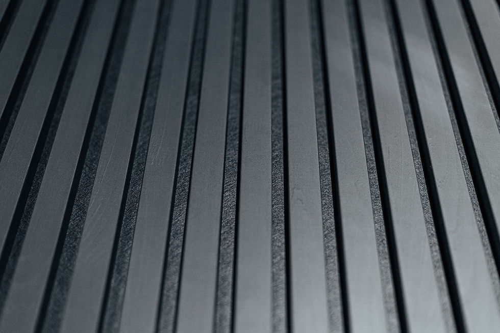 Anthracite solid-aspen acoustic panels installed on a wall