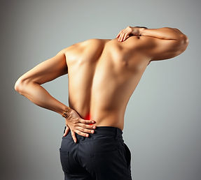 Person experiencing lower back pain from disc injury