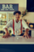 Bartender in red suspenders at the Ready Campaign Launch.