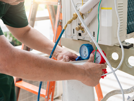 man technician repairing an appliance