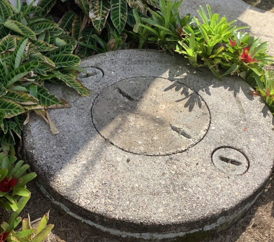 septic tank in a rural backyard