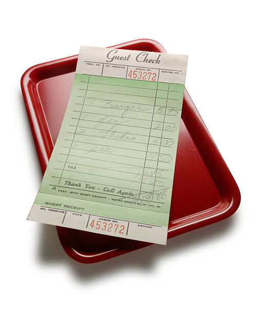 Guest check receipt on a red tray, labeled Guest Check 453272, with handwritten order details.