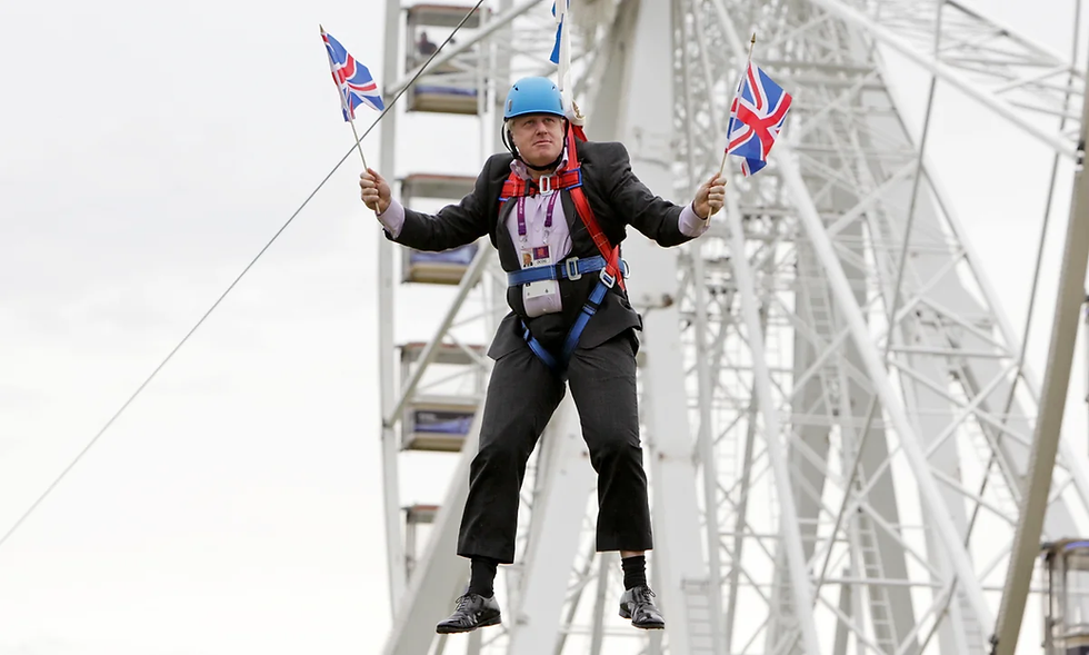Boris Johnson in a suit and helmet zip-lining, holding Union Jack flags. Ferris wheel in the background. Playful mood.