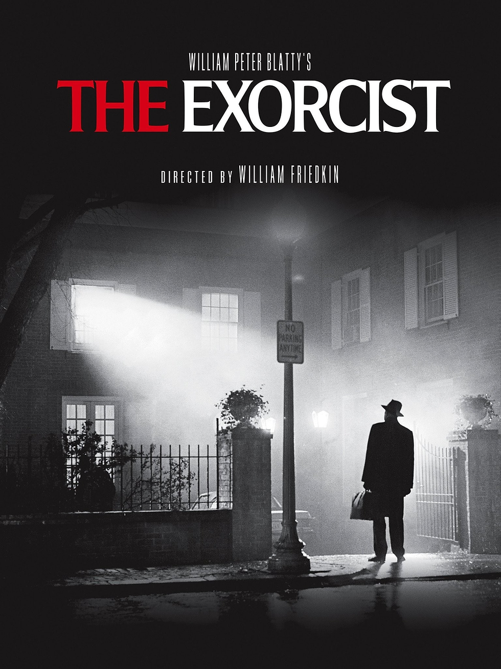 The Exorcist movie poster in black and white, with red title text and a silhouetted man in a foggy street at night.