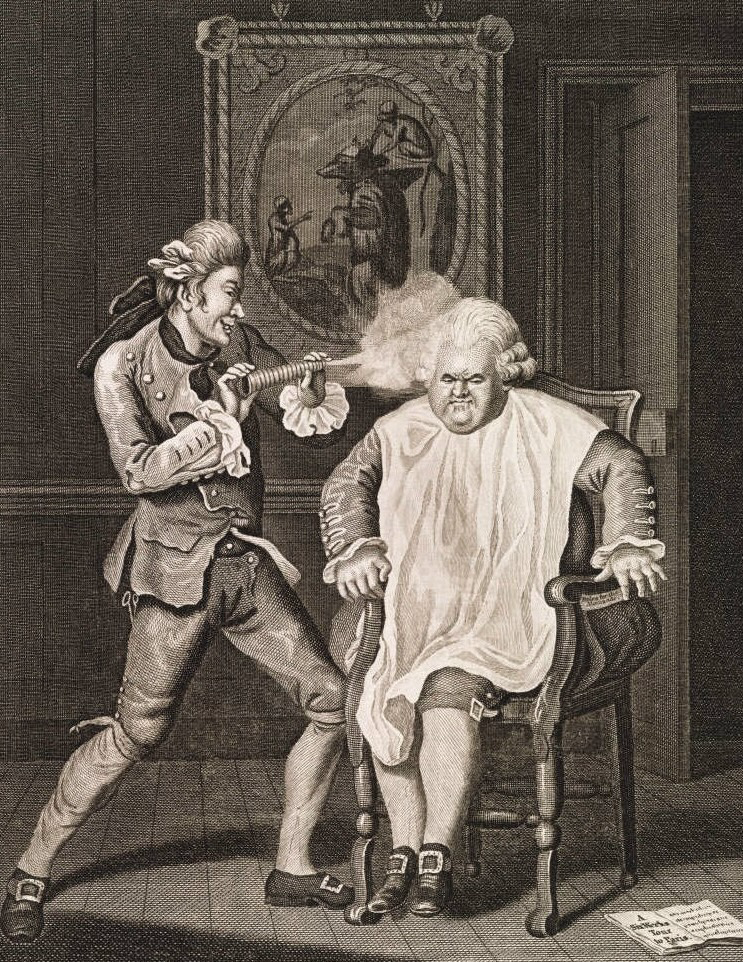 A barber playfully aims a syringe at a customer's face in a vintage setting. Both wear historical attire, with a detailed painting backdrop.