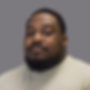 Travis Spencer - med - square - grey_0.5x.png
