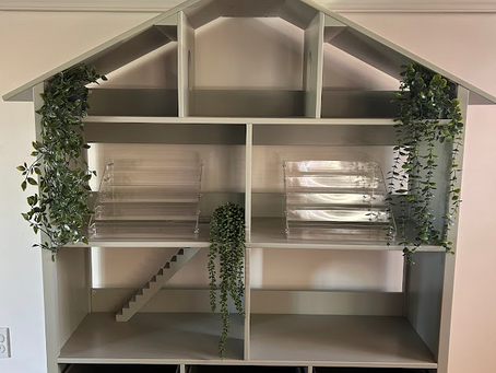 Sun House farmstand sneak peek, a dollhouse-shaped bookshelf set up as a farmstand in La Mirada, CA