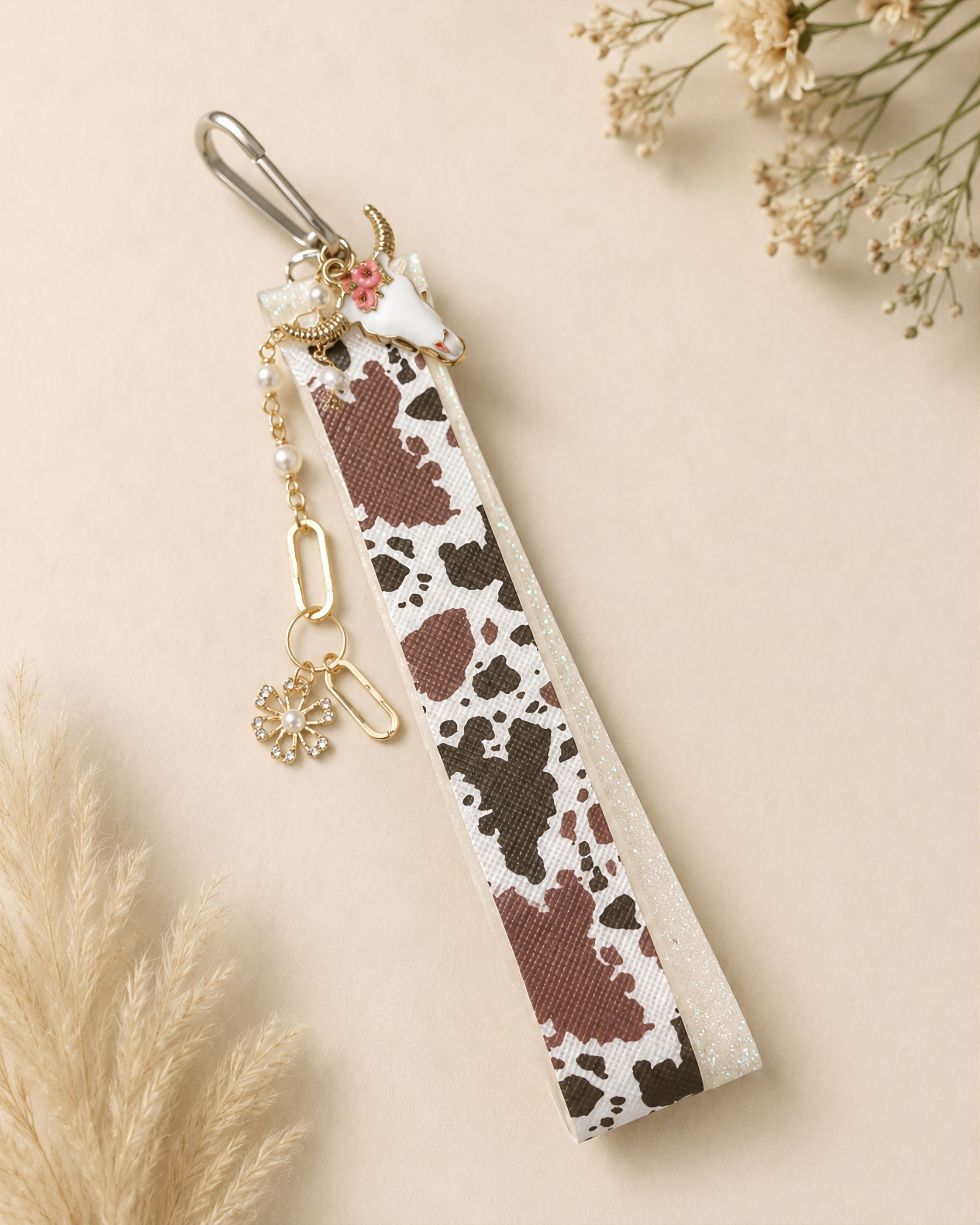 Cow Print & White Sparkle Wristlet with Decorative Bull Charm and Gold Chain