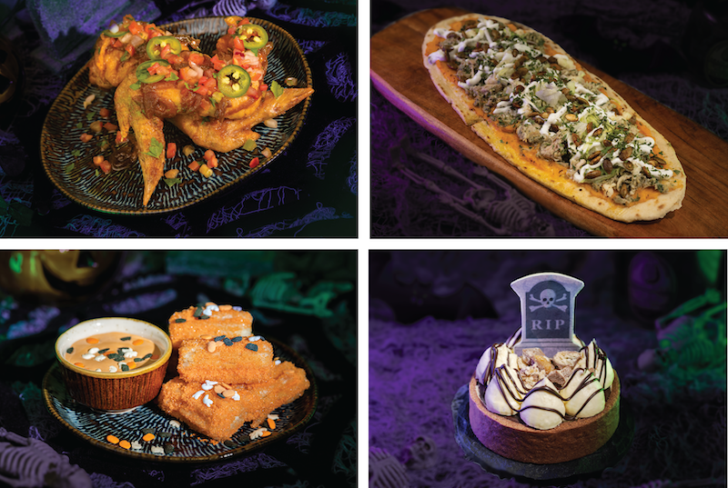 Four Halloween-themed dishes: spicy wings with jalapeños, flatbread, cheese sticks with dip, and a dessert with an "RIP" decoration.