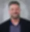 Professional headshot of George Hanshaw, Psy.D., director of digital learning solutions / acting assistant dean.
