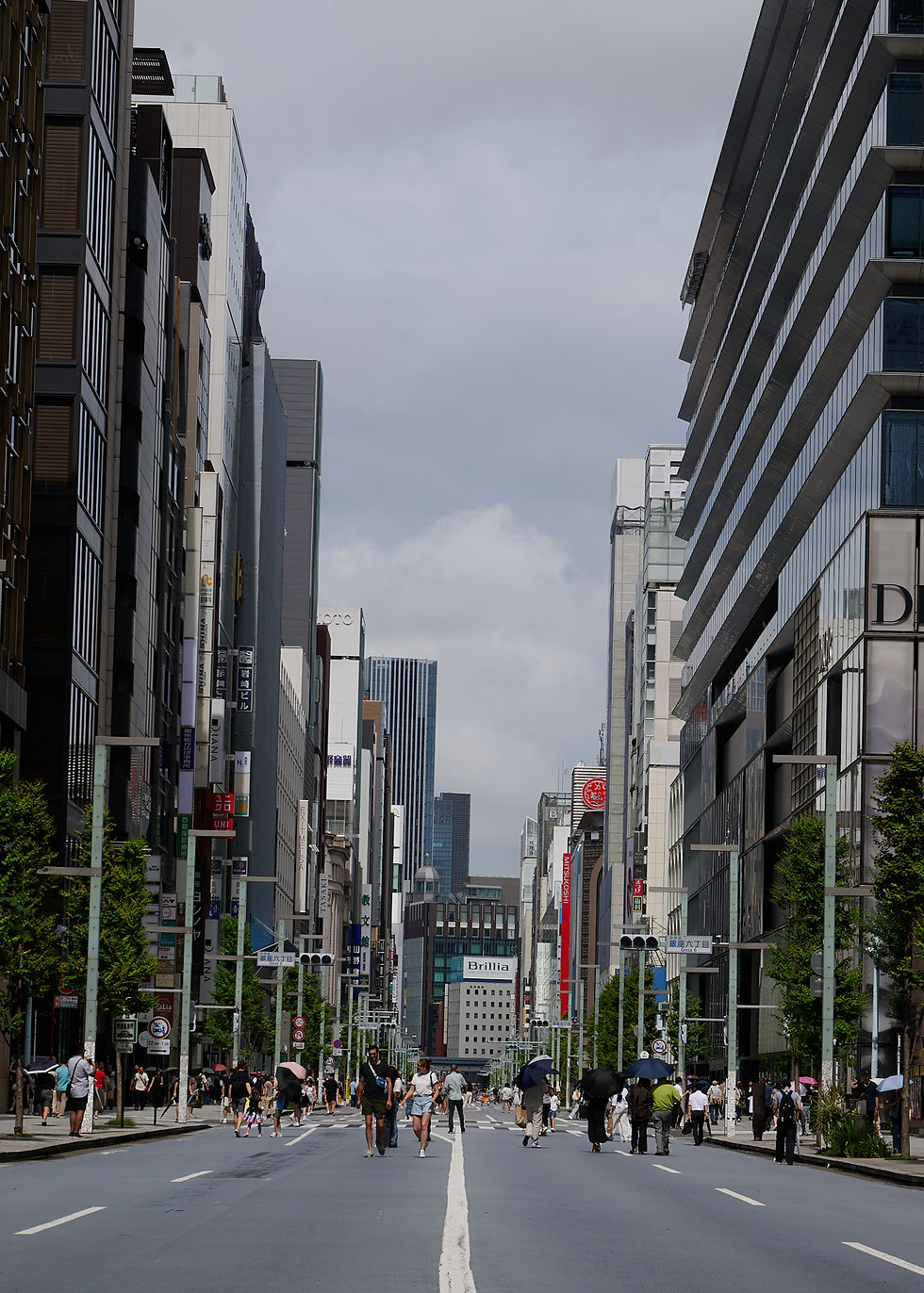People cross the busy streets of Tokyo