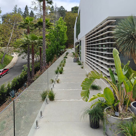 Outdoor frameless glass fence installation in Bel Air