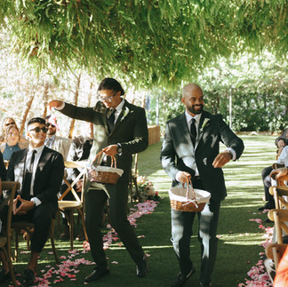 men_acting_as_flower_girls_during_wedding_ceremony
