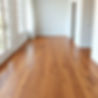 generate an image of hardwood flooring half in the middle of an installation.jpg