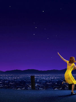 Ryan Gosling and Emma Stone dance together in the poster for the movie "La La Land," with the sunset and purple landscape of Los Angeles in the background.