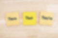 Grammar of  there, their, they're on three sticky notes on textured desk wood_edited.jpg