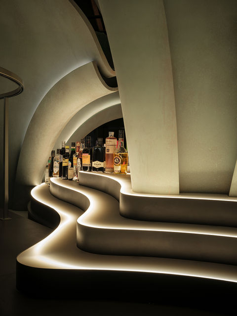 Sculptural uplit bar light detail at Lucia, designed by Preen, Inc.