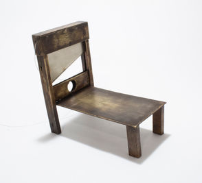 A miniature guillotine. 