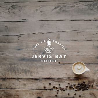 Logo shown in white on a timber background