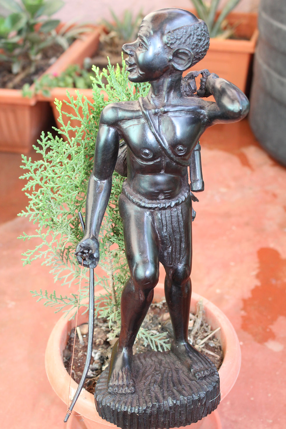 African Hunter Warrior with bow, arrows & Quiver Carrying Gazelle