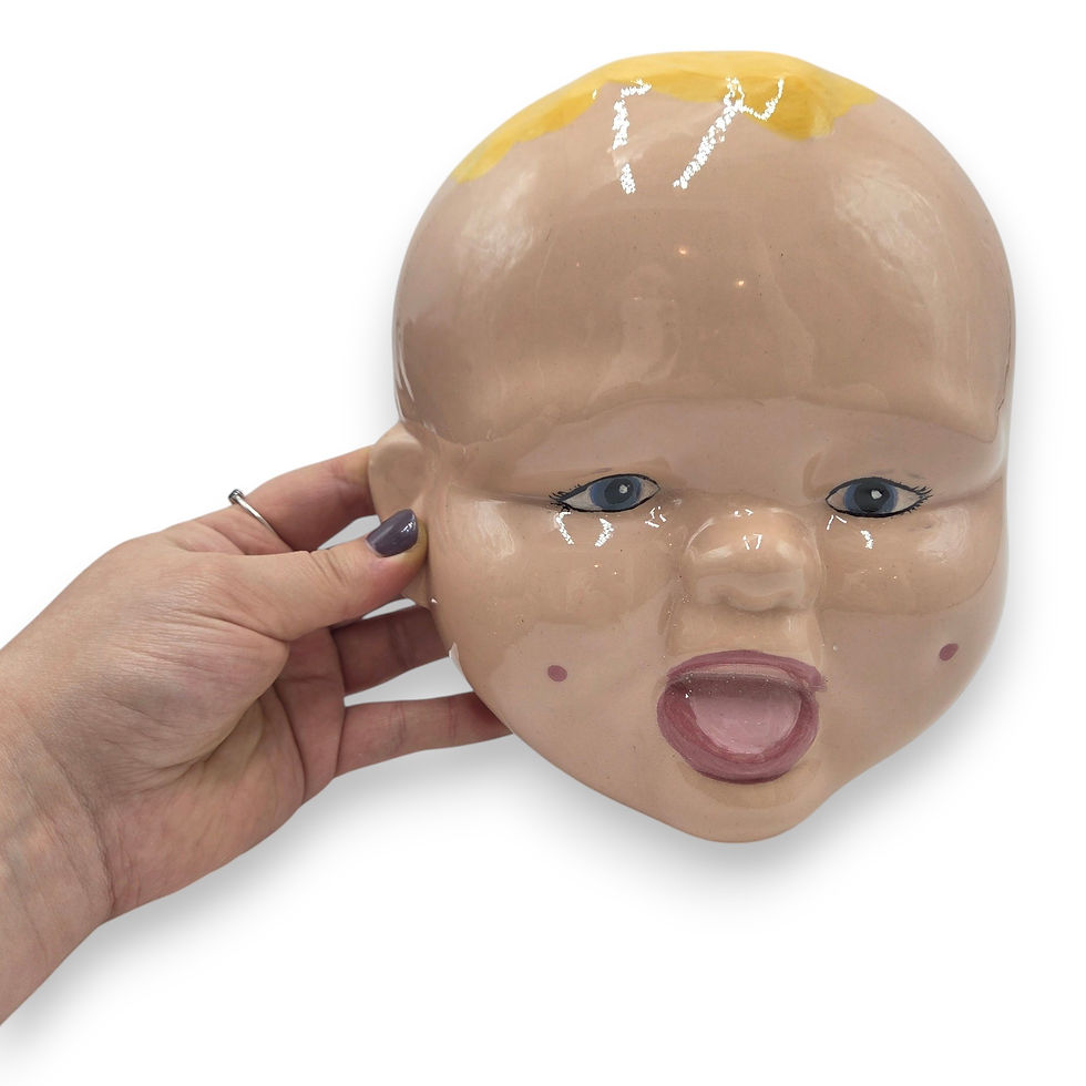 Visage de bébé en céramique | Décoration murale