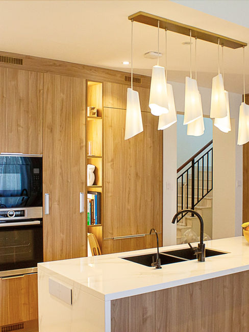 This kitchen includes hidden technology, like a pop-up socket on the island — smart and stylish.