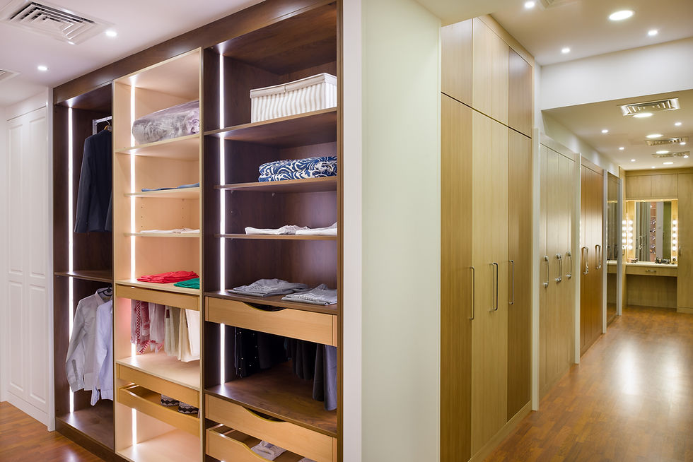 Split double-sided walkin closet by al meera