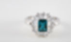 Emerald cut teal gemstone ring from a global trade collection