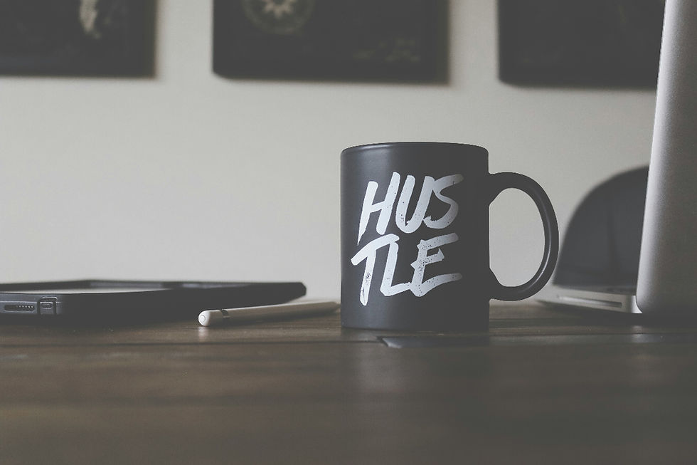 black cup, white script, hustle
