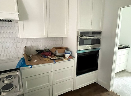 Full House project with painted and stained cabinets