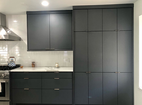 Full House project with painted and stained cabinets