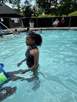 youth learning to swim