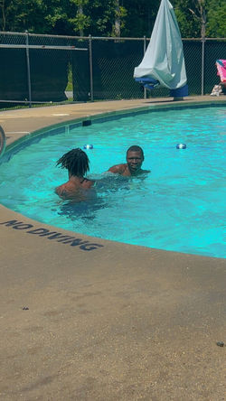 youth learning how to swim