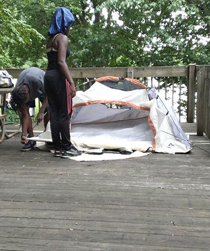 Youth Putting up tent
