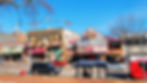 Restaurants and vehicles on Hillsborough Street.