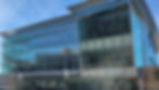 The glass exterior of a recreation center on the campus of NC State University.