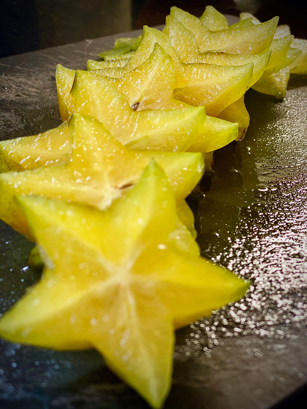 row of chopped star fruit