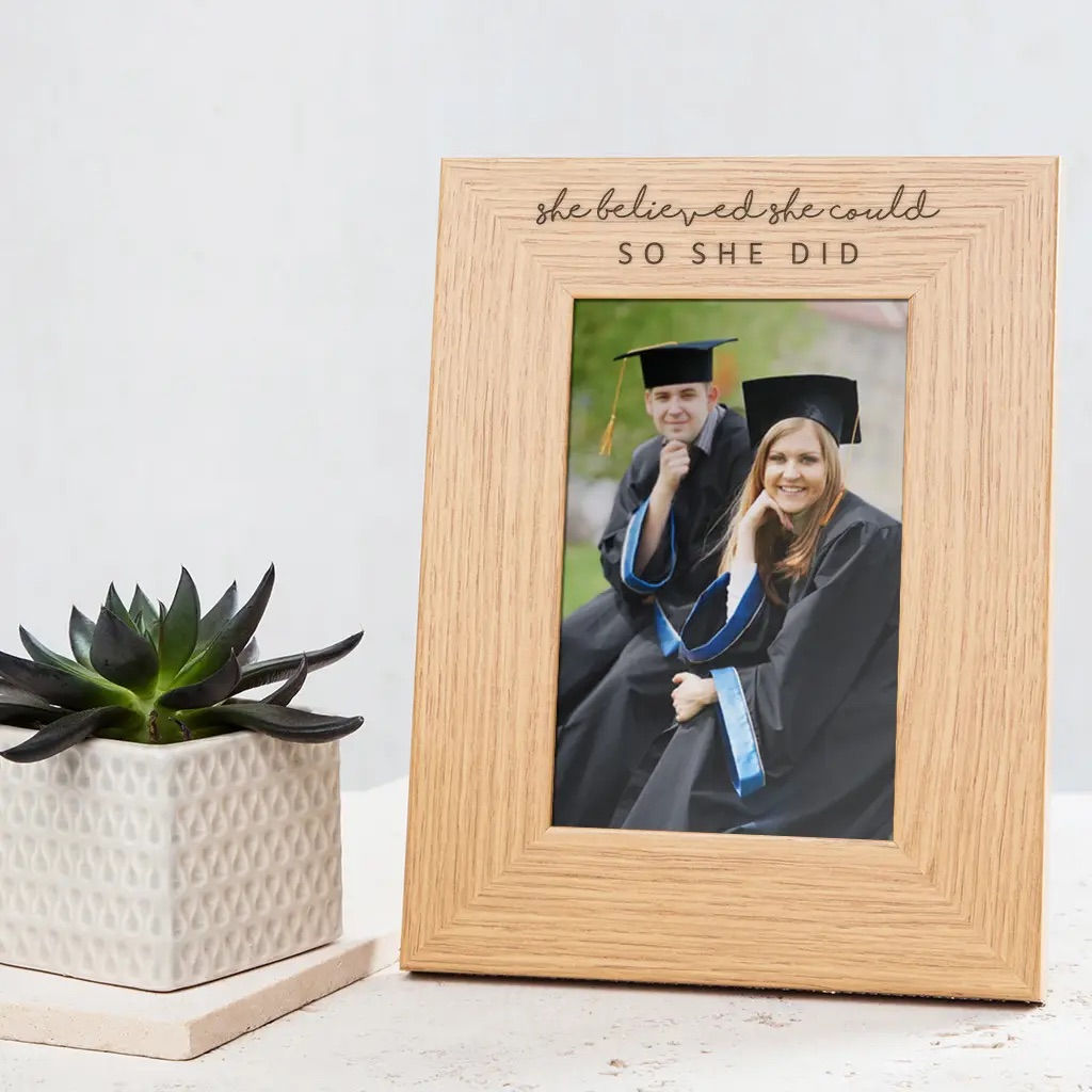Photo frame, oak wood and glass, engraved 'She believed she could..', Graduation
